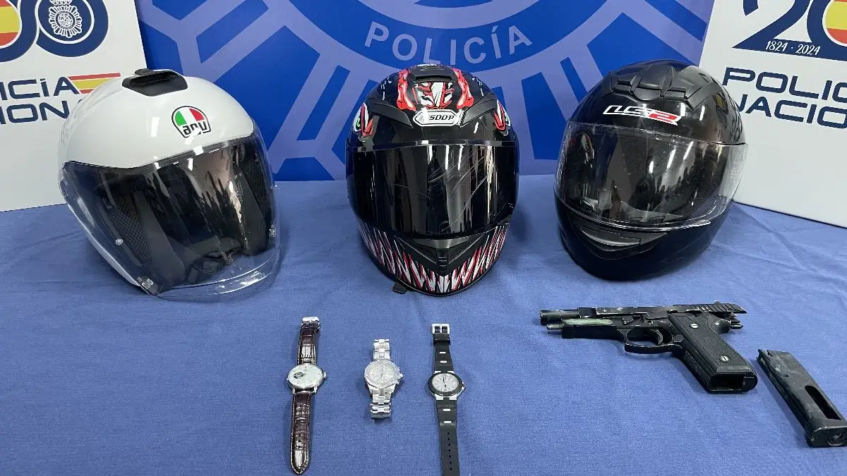 policia relojes de lujo a punta de pistola